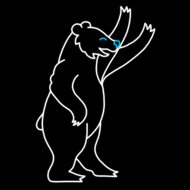 An animated LED display of a waving bear, in profile with its eye and nose made of blue LED lights, outlined in bright white LED lights against a black background. It’s the perfect addition for blue and white Christmas décor.