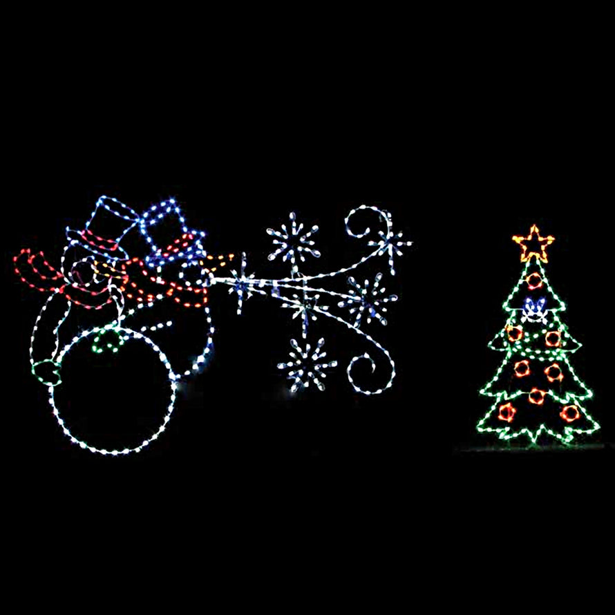 A brightly illuminated scene featuring a snowman blowing snowflakes towards a fully decorated Christmas tree. The snowman is adorned with colorful lights and a flat top hat, while the Christmas tree glows with multicolored ornaments and a shining star on top. The display is set against a dark background, highlighting the vivid blue, green, white, yellow and red LED lights. The perfect Christmas centerpiece for a magical holiday ambiance.