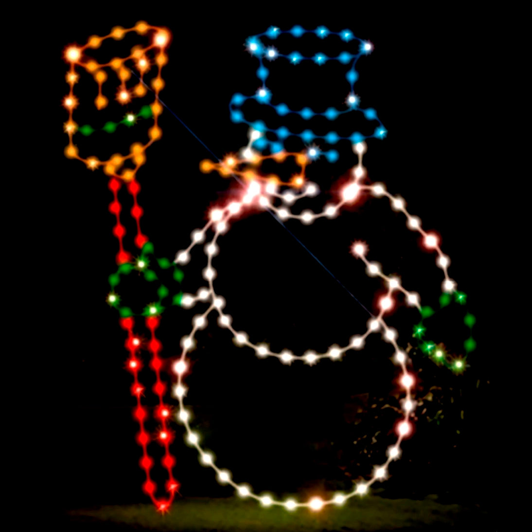 A bright and colorful LED silhouette display of a cheerful snowman holding a shovel, featuring vibrant red, white, blue, yellow, and green LED lights against a dark background.