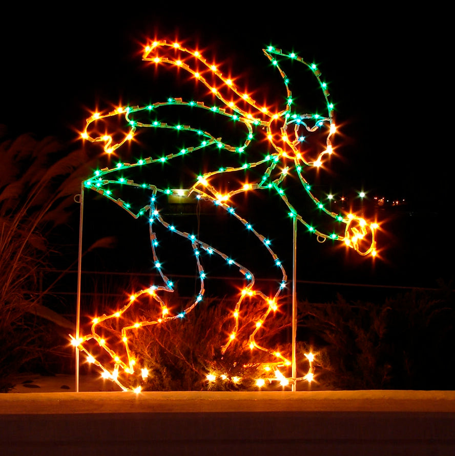 Colorful LED silhouette display of a speed skater, illuminated at night with Christmas red, yellow, green, and blue LED lights, capturing the motion and excitement of winter sports.