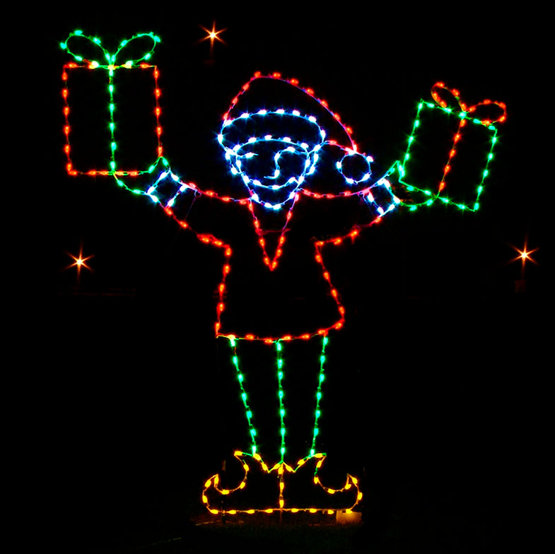 Christmas Elf Bearing Gifts Silhouette LED Display featuring a scene of a happy elf holding two beautifully wrapped presents. The display is illuminated with bright red, green, and white LED lights, creating a dynamic and festive scene against a black background. This playful and charming display is perfect for commercial Christmas decorations, ideal for businesses, theme parks, municipalities, and event venues looking to enhance their holiday displays.