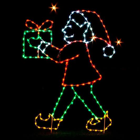 Christmas Elf Walking Silhouette LED Display featuring a cheerful elf carrying a wrapped gift. The display is illuminated with bright red, green, and white LED lights, highlighting elf hat, clothing, and the gift box. Set against a black background, the vibrant lights create a festive and joyful ambiance, making this display ideal for theme parks, parades, and event venues looking to enhance their holiday events.