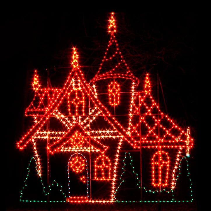 Christmas Elves Cozy Cottage LED Display featuring a whimsical and intricately designed elves' cottage. The cottage is illuminated with vibrant red and white LED lights, and highlighting the details of the cottage's roof, windows, and surrounding green trees. Set against a black background, the colorful lights create a magical and festive ambiance.