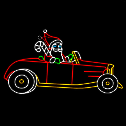 An animated silhouette LED display of Santa Claus driving a red roadster. Santa is holding a candy cane and waving, outlined with bright white, red, yellow, green, and blue LED lights, set against a black background.