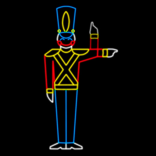 An animated silhouette LED display of a toy soldier in a colorful uniform, with a tall blue hat, pointing to the right. The soldier is outlined with bright red, yellow, blue, and white LED lights, set against a black background.
