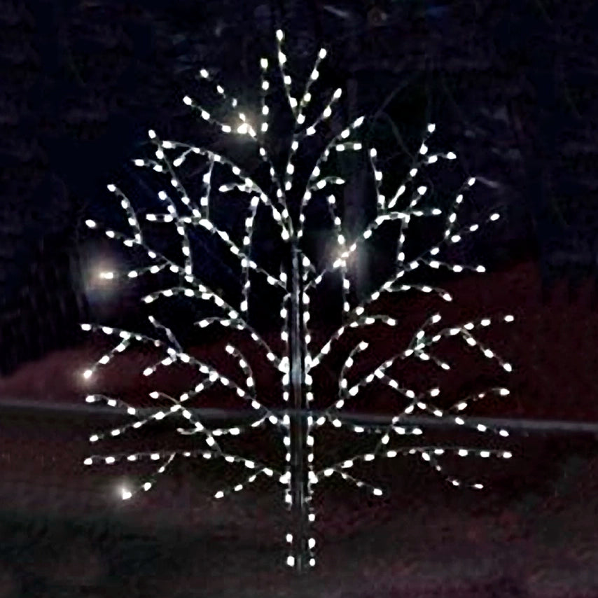 A stunning 12 foot Christmas tree silhouette LED display with bright white LED lights outlining the branches against a dark background. The perfect Christmas centerpiece for a magical holiday ambiance.